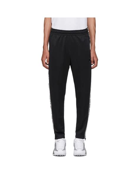 nike tape track pants black herren preise|Nike: Black Swoosh Tape Track Pants .